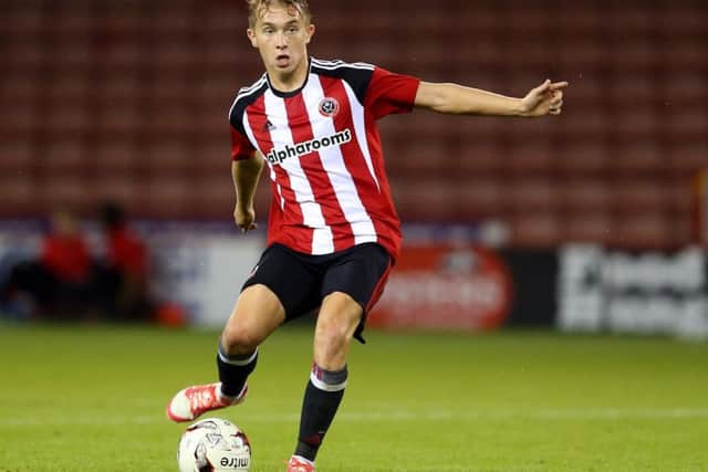 Sheffield United's Louis Reed would have played tonight but is away with England
