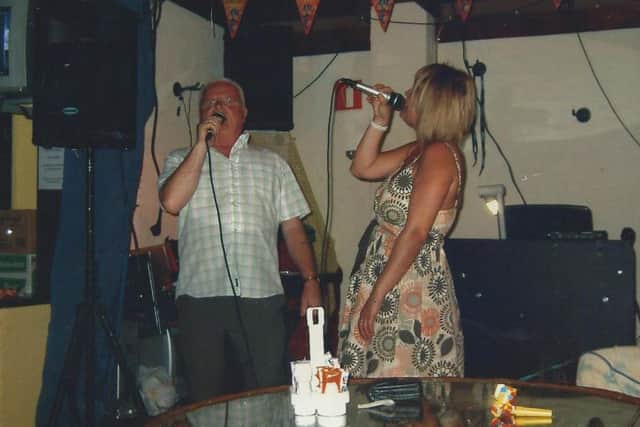 Joanne singing with her dad Jimi