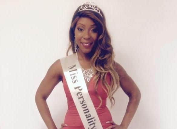 Rochelle with her Miss Caribbean UK sash.