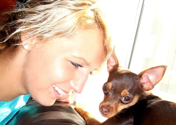 Kate Grundane, with her pet dog Molly. Molly was killed by another dog who fatally bit her while she was out walking with Kate's mum Elen on October 26.