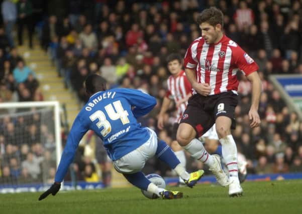 Npower League One Football - Chesterfield FC v Sheffield Utd at b2Net Stadium 
Ched Evans tries to get the ball off Tope Obadeyi