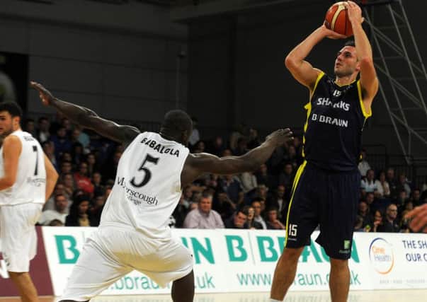 Sheffield Sharks' Mike Tuck scores against Manchester Giants. Picture: Andrew Roe