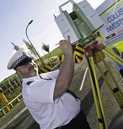Sergeant Steve Askham, pictured with aLeica 3D Laser Scanner, used during Collision Investigations. Picture: Marie Caley NSST Police Collision MC 24