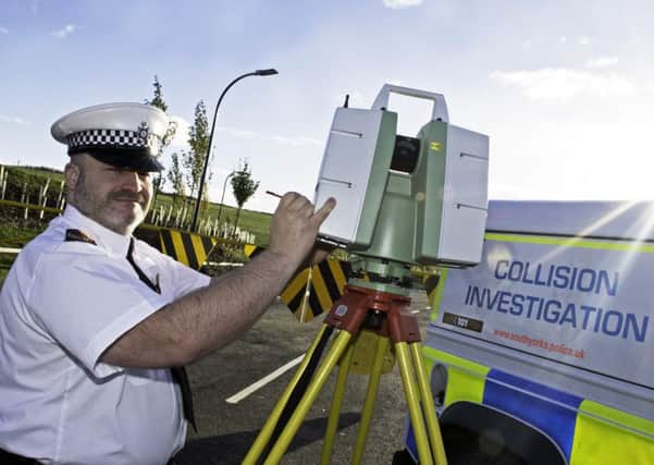 Sergeant Steve Askham, pictured with aLeica 3D Laser Scanner, used during Collision Investigations. Picture: Marie Caley NSST Police Collision MC 27