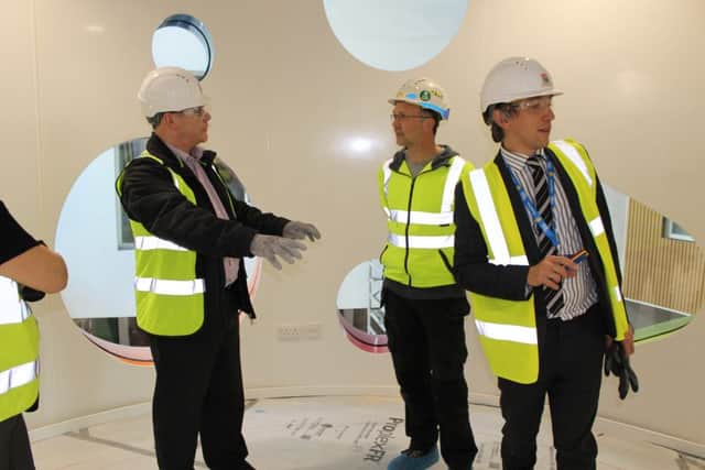 Graham Royle has a tour of the play tower in the hospital's new wing