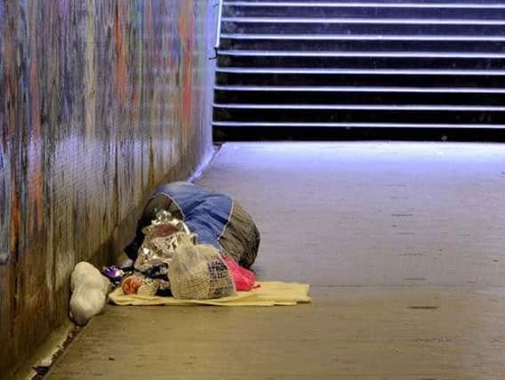 Stock photo of a homeless person. Credit: Albert Bridge