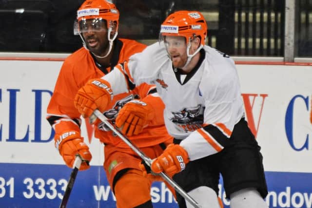 Steelers new signing Yared Hagos, battling with team-mate Markus Nilsson, during training. Picture: Marie Caley