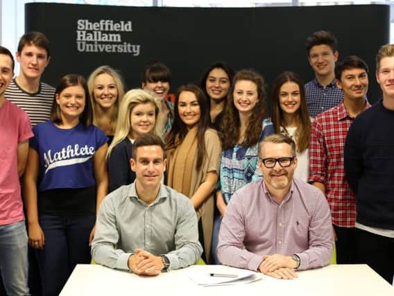 Apprentices on Sheffield Hallam University's chartered management course, run with Nestle, with Tom Banham, then head of academy talent acquisition at Nestle and Tim Davidson-Hague, head of executive education and corporate programmes at Sheffield Hallam.