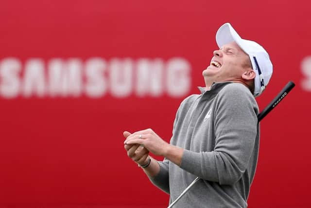 Danny Willett enjoys a rare laugh during the Ryder Cup