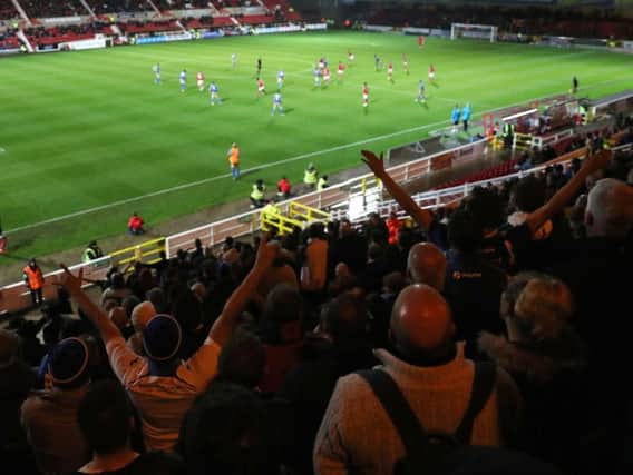 Fans at Eastleigh's FA Cup replay against Swindon Town last night