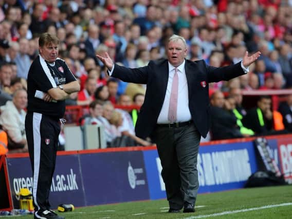 Steve Evans and Paul Raynor have linked up against at Mansfield Town