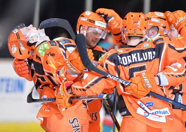 Sheffield Steelers players celebrate one of five goals against Belfast Gaints - Pic: Dean Wooley