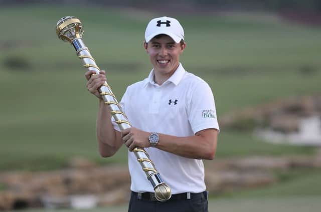 Matt Fitzpatrick holds the trophy after he won the final round of the DP World Tour Championship at the Jumeirah Golf Estates  (AP Photo/Kamran Jebreili)