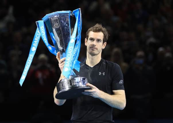 Andy Murray celebrates winning the championship during day eight of the Barclays ATP World Tour Finals at The O2, London.
