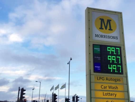 The fuel prices at a Morrison's petrol station. Peter Byrne/PA Wire