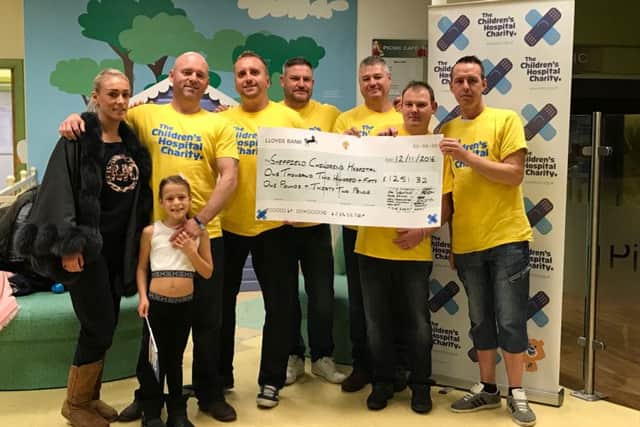 Mitch Anderson (third from left) with fellow fundraisers