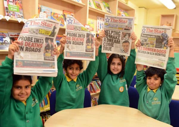 The Star Reader passport at Owler Brook School. Maryam Ahmed aged 9 Ali Alansi, 9, Zara Shayciq 10 and Hasan Hussain, 11