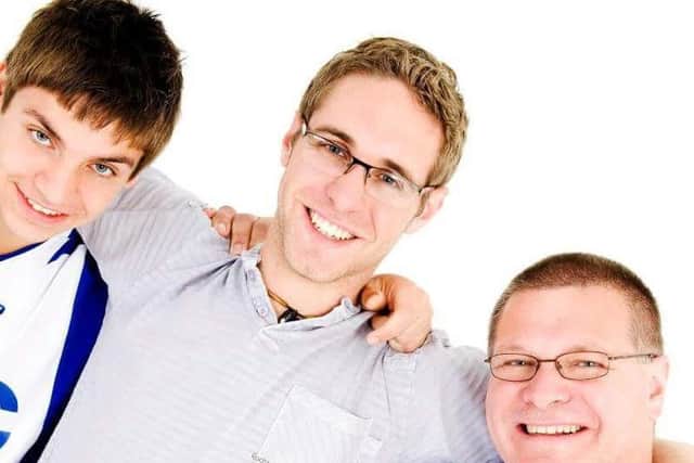 Bone marrow donor Mark Clements (middle) with brother Andy and dad Dave. Photo: The Clements family