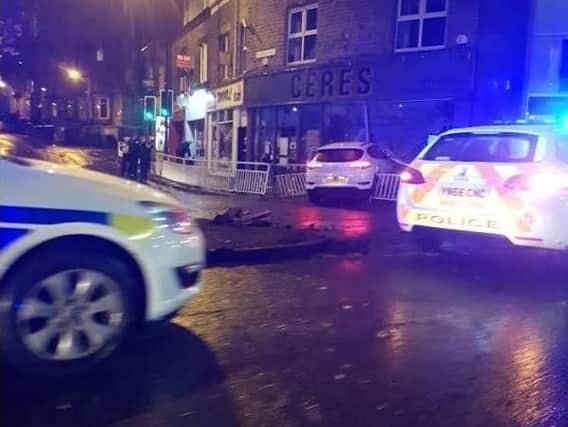 A driver was arrested for dangerous driving after ploughing into a cafe on Hunters Bar roundabout