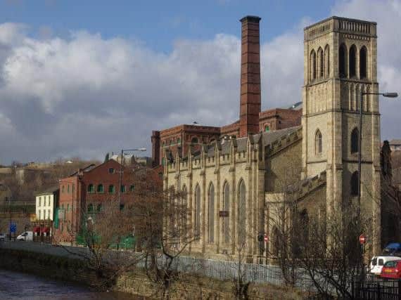 Aizlewood's Mill and the New Testament Church of God alongside the River Don in Sheffield. Photo: Stephen McKay