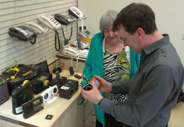 Rob McCann, equipment centre co-ordinator, advising a customer on specialist equipment.
