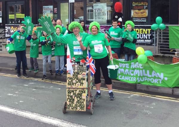 John at the Macmillan Cheer point on Ecclesall Road for this year's Yorkshire Half Marathon with Ecclesall Scouts