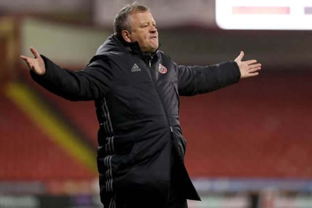Blades boss Chris Wilder on the touchline during United's late win over Bury