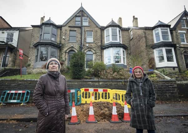 Jenny Hockey and Freda Brayshaw (right) who were arrested by police after protesting against a controversial tree felling programme, while contractors started cutting down trees with chainsaws before dawn in Rustlings Road, Sheffield.