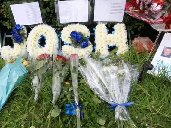 Tributes left at the scene to Josh on Mansfield Road
