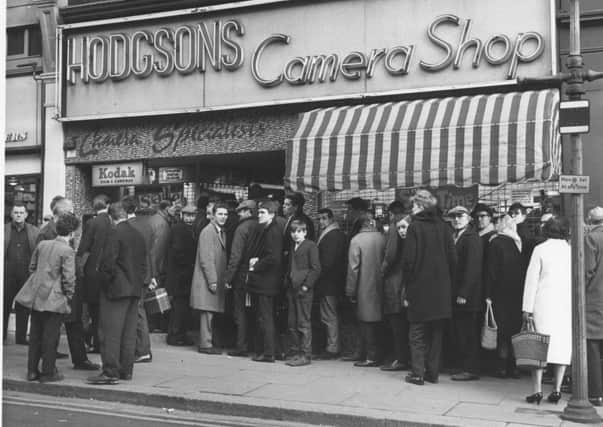 Big queues for the sale at Hodgsons Camera Shop in Sheffield city centre