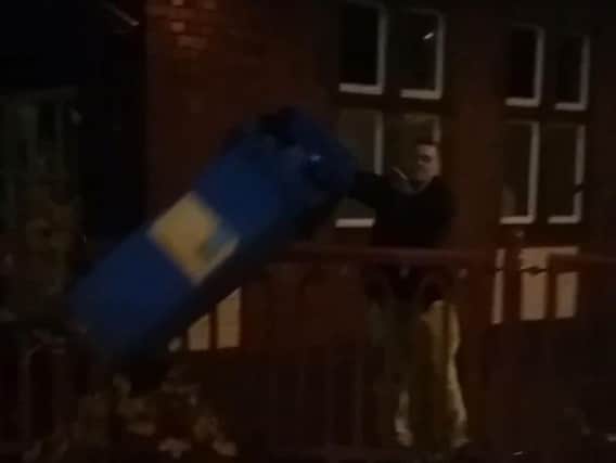 The bin is hurled into the River Sheaf. (Photo: YouTube).