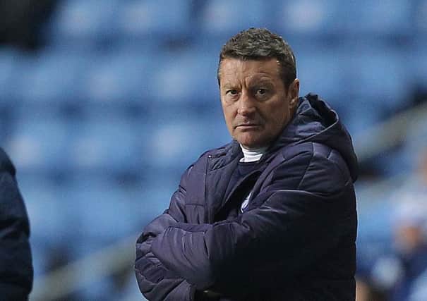 Danny Wilson looks on as the clock counts down at the end of the match against Coventry