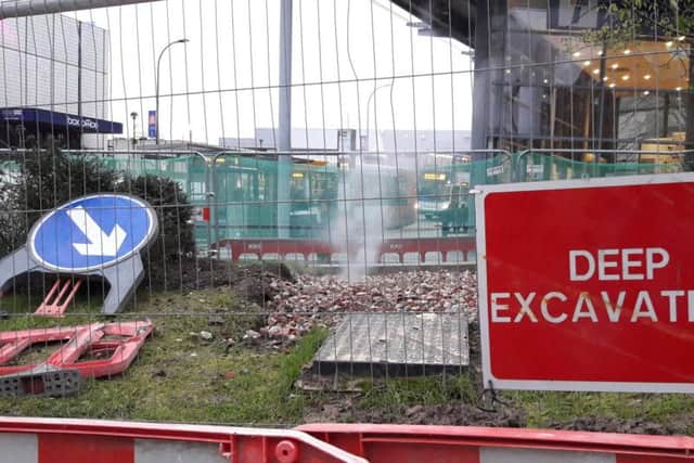 Signs warn passers by to 'Keep Out' because of 'Deep Excavation' work