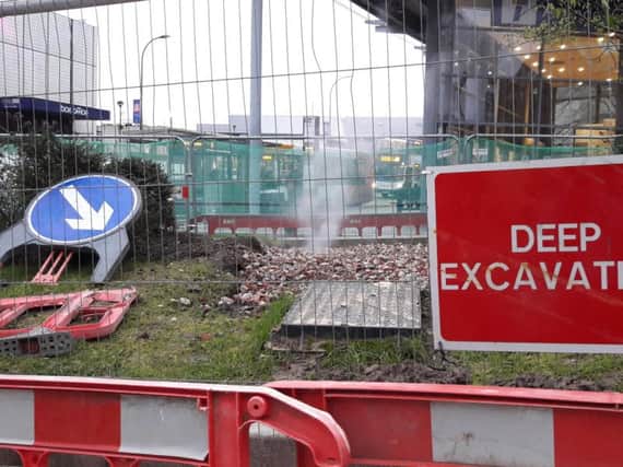 Signs warn passers by to 'Keep Out' because of 'Deep Excavation' work
