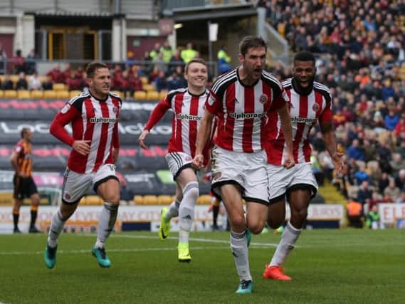 Chris Basham celebrates after scoring against Bradford City