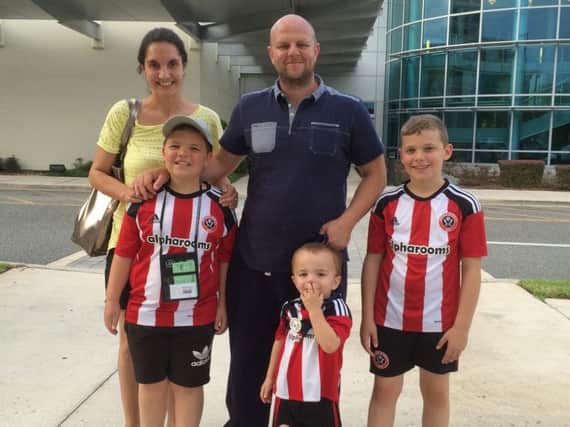 Reece on the left with dad David, step mum Michelle and brothers Charlie and Findley outside the UF Health Proton Therapy Institute in Jacksonville Florida
