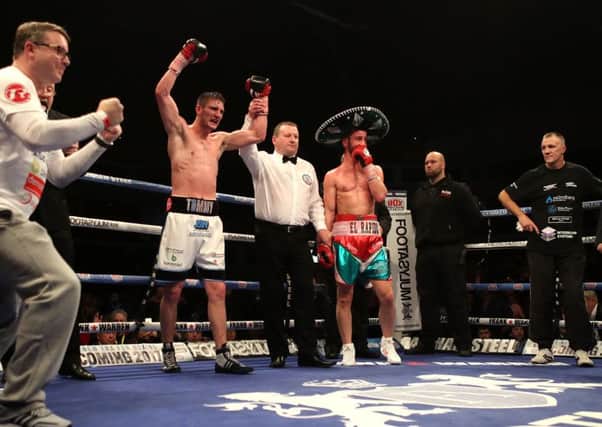 Tommy Langford celebrates victory over  Sam Sheedy during the Vacant British Middleweight Championship bout at the Cardiff Motorpoint Arena. PicL Nick Potts/PA Wire