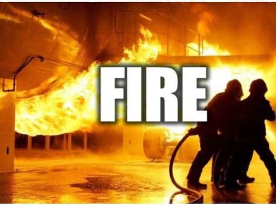 Fire crews tackle scrap blaze