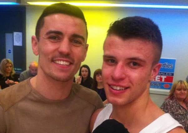 Tommy Frank, right, with fighting legend Anthony Crolla