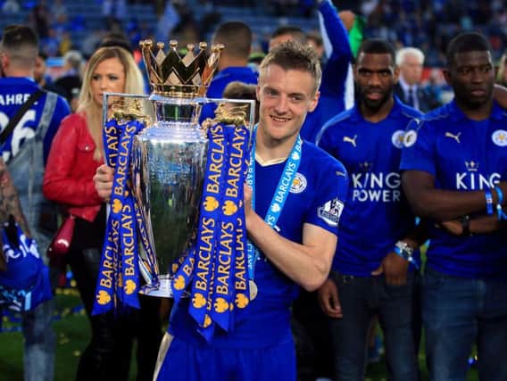 Jamie Vardy with the Premier League trophy he won at Leicester City last season