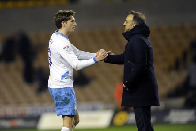 Adam Reach, left, and Carlos Carvalhal