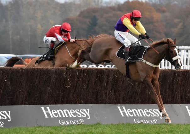 HENNESSY HEROES -- Native River, ridden by Richard Johnson and trained by Colin Tizzard, lands the 60th running of the Hennessy Gold Cup at Newbury.