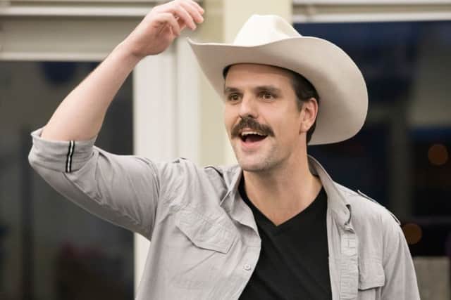 Ben Lewis rehearsing for Annie Get Your Gun