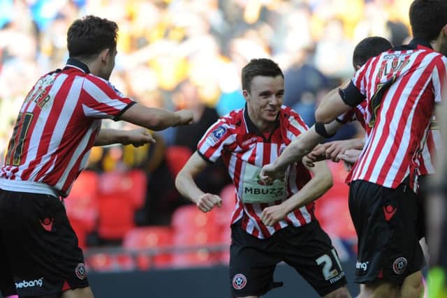 Stefan Scougall celebrates after scoring in the FA Cup semi-final at Wembley against Hull