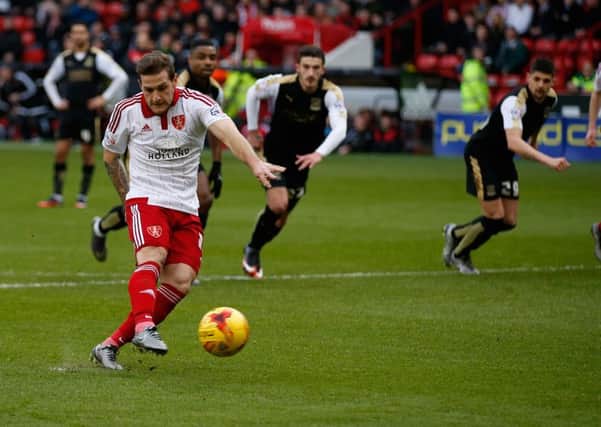 Billy Sharp has scored twice in his last two games for United against Swindon - including this penalty at Bramall Lane back in January