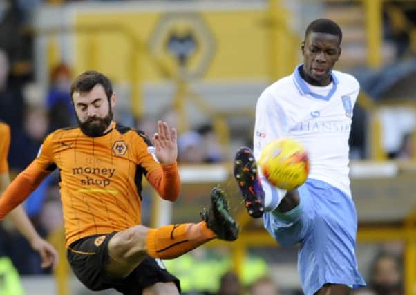 Owls Lucas Joao with Wolves Jack Price