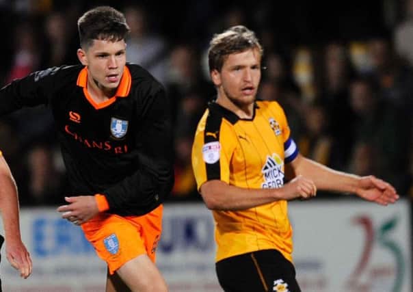 George Hirst in action for the Owls against Cambridge United