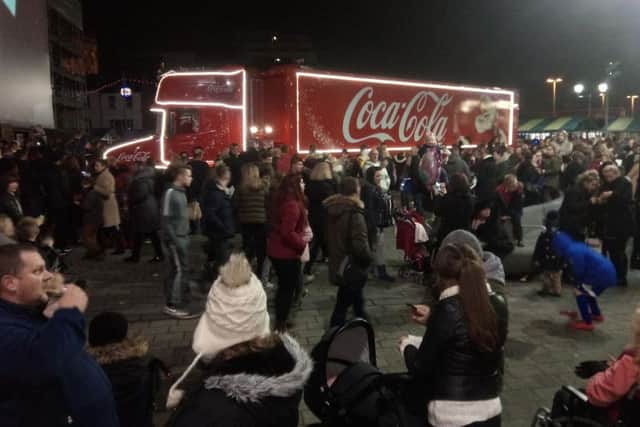 Doncaster crowd clamours around Coca Cola truck. Photo:Darren Burke