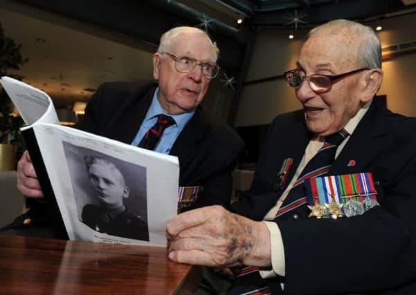Frank Yates (l) and Don Walker are receiving the French Legion of Honour medal. Picture: Andrew Roe