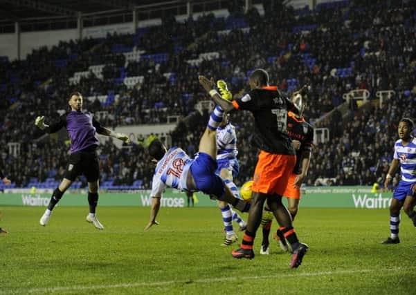 Keiren Westwood goes up for a corner late on at Reading